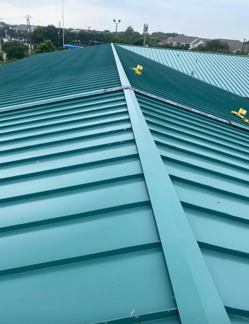 Green commercial metal roof ridge and valley for Metal Roof Repair in Pascagoula